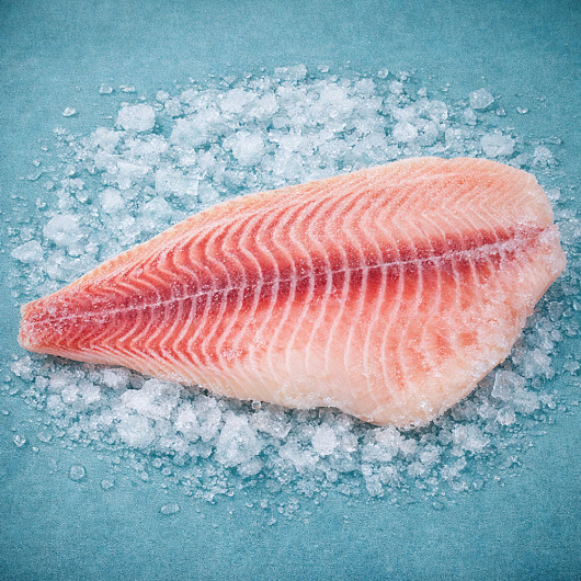 Фото Филе тилапии 5/7 с/м. 5% вес 1/10 кг